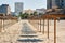 Parasols in a row on the sandy beach in Palma Nova district of Majorca tourist resort, Balearic Islands, Spain