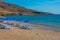 Parasols and sunbeds at Kato Zakros beach at Crete, Greece