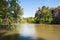 Parc des buttes Chaumont lake on a sunny day