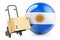 Parcel on the hand truck with Argentinean flag. Shipping in Argentina, concept. 3D rendering