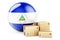 Parcels with Nicaraguan flag. Shipping and delivery in Nicaragua, concept. 3D rendering