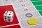 Parcheesi board game detail with dice and game piece