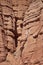 Pareidolic illusion, seeing faces in inanimate objects. Face on sandstone rock. Pareidolia, looks like a face