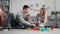 parent-child relationship, young joyful married couple with little daughter have fun enjoying game in colored ecological