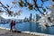 Parent-child walking in Vancouver seawall trail in springtime.