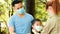 Parent and child wear face mask during coronavirus and flu