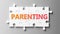 Parenting complex like a puzzle - pictured as word Parenting on a puzzle pieces to show that Parenting can be difficult and needs