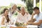 Parents and Adult Children enjoying Al Fresco Meal