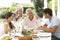 Parents and Adult Children enjoying Al Fresco Meal