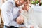 Parents with baby at christening in church