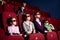 Parents with children at the cinema
