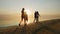 Parents with children walk in the sand on the beach.