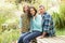 Parents And Daughter Having Picnic