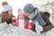 Parents and girl drink tea as family