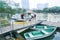 Parents and kid prepare to get in boat and water cycle in public park taken in Lumpini Park Bangkok Thailand