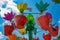 Parents and kids enjoying  colorful flower pots aboard Abbyâ€™s Flower Tower at Seaworld in International Drive area  2