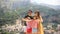 Parents and kids taking selfie photo background Positano town in Itali on Amalfi coast