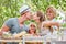 Parents kiss at the breakfast table