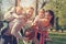 Parents playing with their children in the park with basket ball.