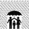 Parents protect child with umbrella in rain