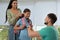 Parents saying goodbye to their daughter in school