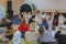 parents are watching the performance children in kindergarten. A children\'s holiday in the kindergarten. blurry