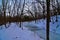 Parfreys Glen State Natural Area in Winter frozen creek along the trail