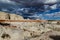 Paria Rimrock badlands with storm clouds and rain