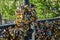 PARIS - APRIL 2014: Love Padlocks at Pont des Arts on April 17, 2014, in Paris, France. Lots of colorful locks on a