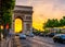 Paris Arc de Triomphe Triumphal Arch in Chaps Elysees at sunset, Paris