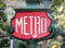 Paris architecture Metro sign in the streets balconies windows and details in French city architectural art in Europe