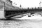 Paris in black & white. Sailing on the river Seine under the bridges of the city