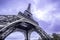 Paris. Eiffel Tower scenic bottom view. Purple sky