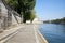 Paris, empty Seine river docks wide angle view in a sunny day