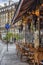 Paris, France, 09/10/2019: Vintage street cafe in a modern European city. Vertical