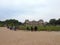 Paris, France - 4 june 2016: Jardin du Luxembourg Senat -Luxembourg palace in Paris, France. People walking in garden of palace.