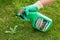 Paris, France - August 15, 2018 : Gardener using Roundup herbicide in a french garden. Roundup is a brand-name of an herbicide con