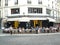 Paris, France, August 20: clients sitting at open air tables in a traditional French brasserie