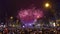 PARIS, FRANCE - DECEMBER, 31. Beautiful New year fireworks above famous triumphal arch, Arc de Triomphe. Tourists