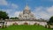 Paris, France - exterior of Sacre-Coeur minor basilica. Sacred Heart church up Montmartre hill. City landmark. Panorama day