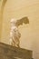 PARIS, FRANCE , JANUARY 26, 2017: Winged Victory of Samothrace, called Nike of Samothrace, hellenistic marble sculpture