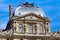 PARIS, FRANCE - JUNE 23, 2017:  Gable of the Pavillon Sully of the Louvre. Is the world largest art museum and is housed in the