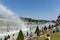 Paris, France, June 27, 2019: tourists and locals taking a bath in the Jardins du Trocad ro Guardians of the Trocadero under the