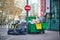 Paris, France - March 16, 2023: Messy streets with overfull garbage bins during binmen strike in Paris, France