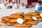 PARIS, FRANCE - MAY 20, 2017: Blur image of  annual bread festival at Notre Dame Cathedral.  Freshly baked baguettes and boules on