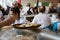 PARIS, FRANCE - MAY 20, 2017: Blur image of  annual bread festival at Notre Dame Cathedral.  Freshly baked baguettes and boules on