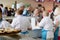 PARIS, FRANCE - MAY 20, 2017: Blur image of  annual bread festival at Notre Dame Cathedral.  Freshly baked baguettes and boules on