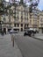 PARIS, FRANCE - MAY 24, 2022: traditional haussmann buildings made of hewn stone and gray roofs.