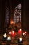 Paris, France - October 28, 2018: Interior of Notre Dame de Paris cathedral. Small altar with blurred offering candles on