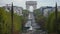 PARIS, FRANCE - OCTOBER 8, 2017. Car traffic near famous Arc de Triomphe or Triumphal Arch, telephoto lens shot